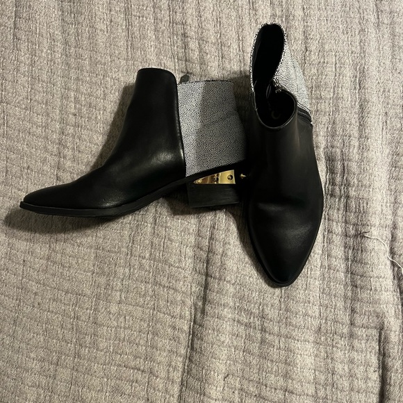 Black bootie with pattern heel and gold spike heel. 1.5 inch heel. Like new. - Picture 6 of 6